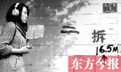 昨日，東方今報記者走訪農業路沿線，看見“拆”字已上墻