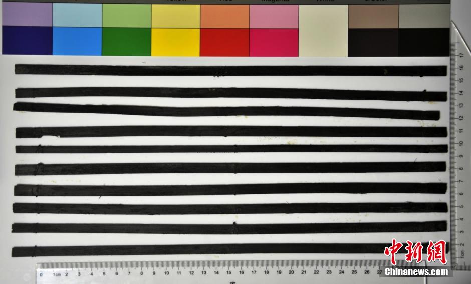 圖為漢代簡牘出土930支竹簡，在四川地區首次發現漢代簡牘。