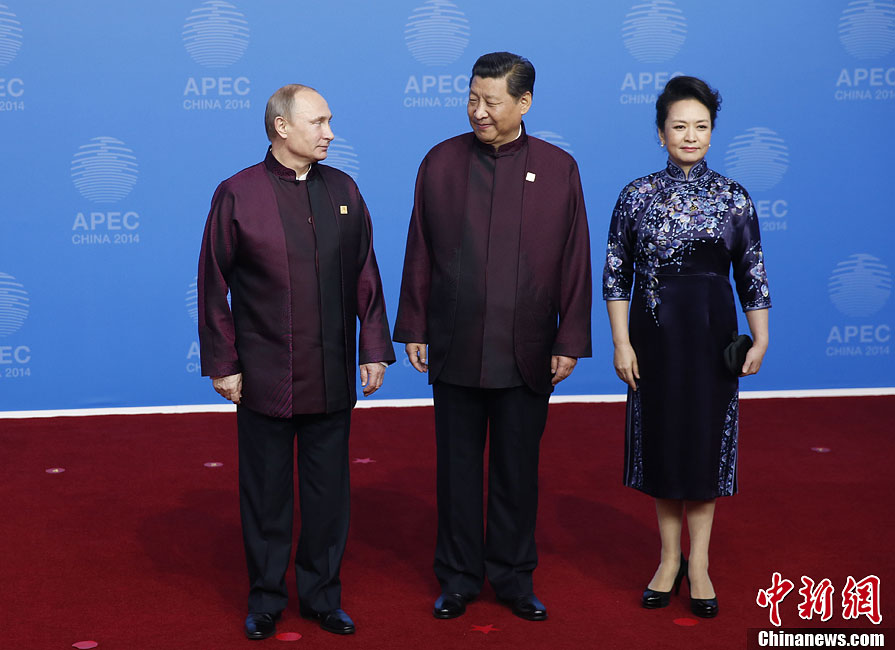 圖為習(xí)近平夫婦歡迎俄羅斯總統(tǒng)普京。中新社發(fā) 杜洋 攝